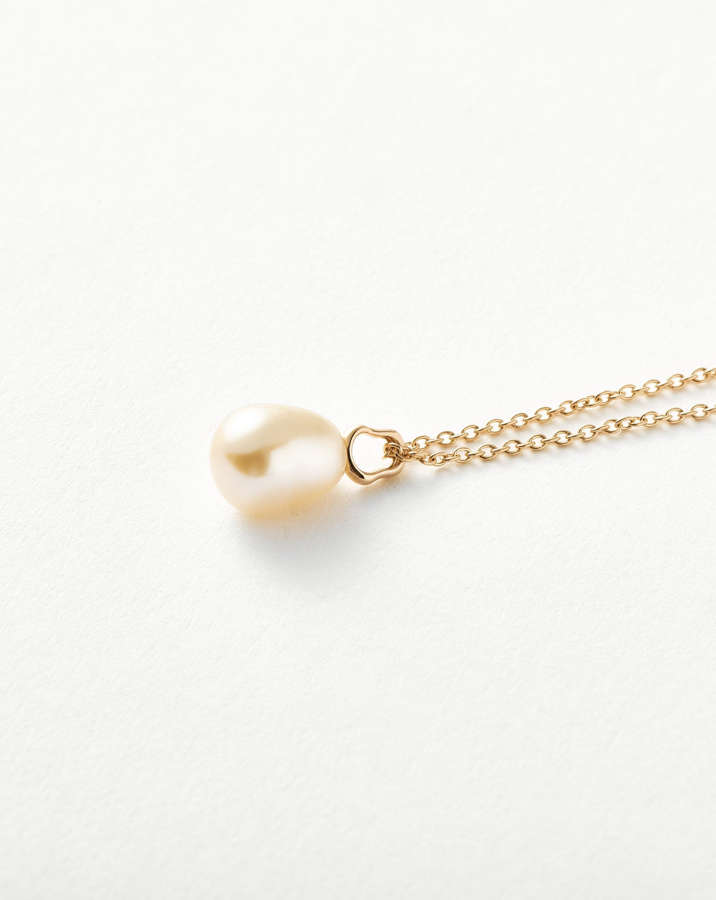 Simple gold and pearl on sale necklace