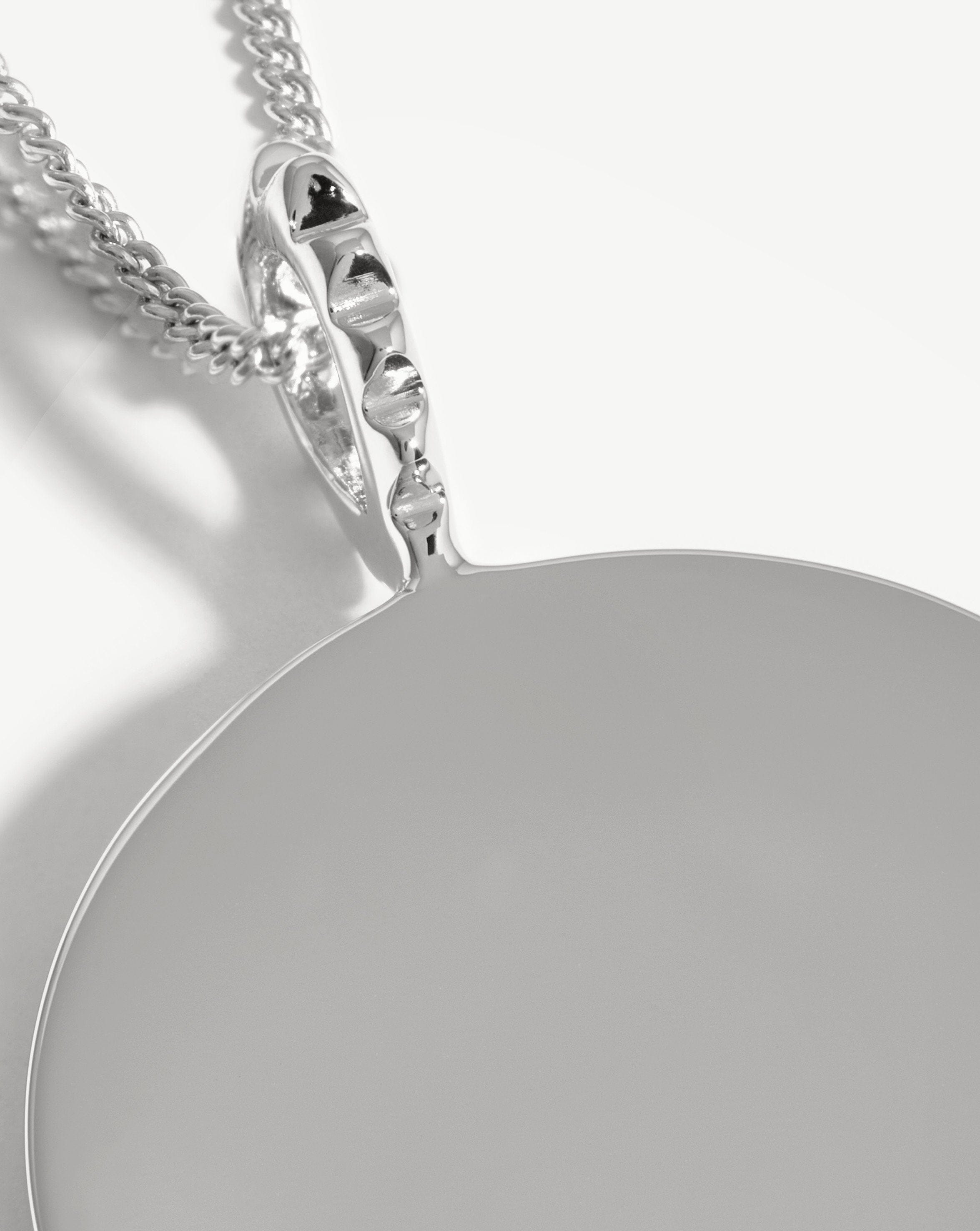 Silver clearance disk necklace